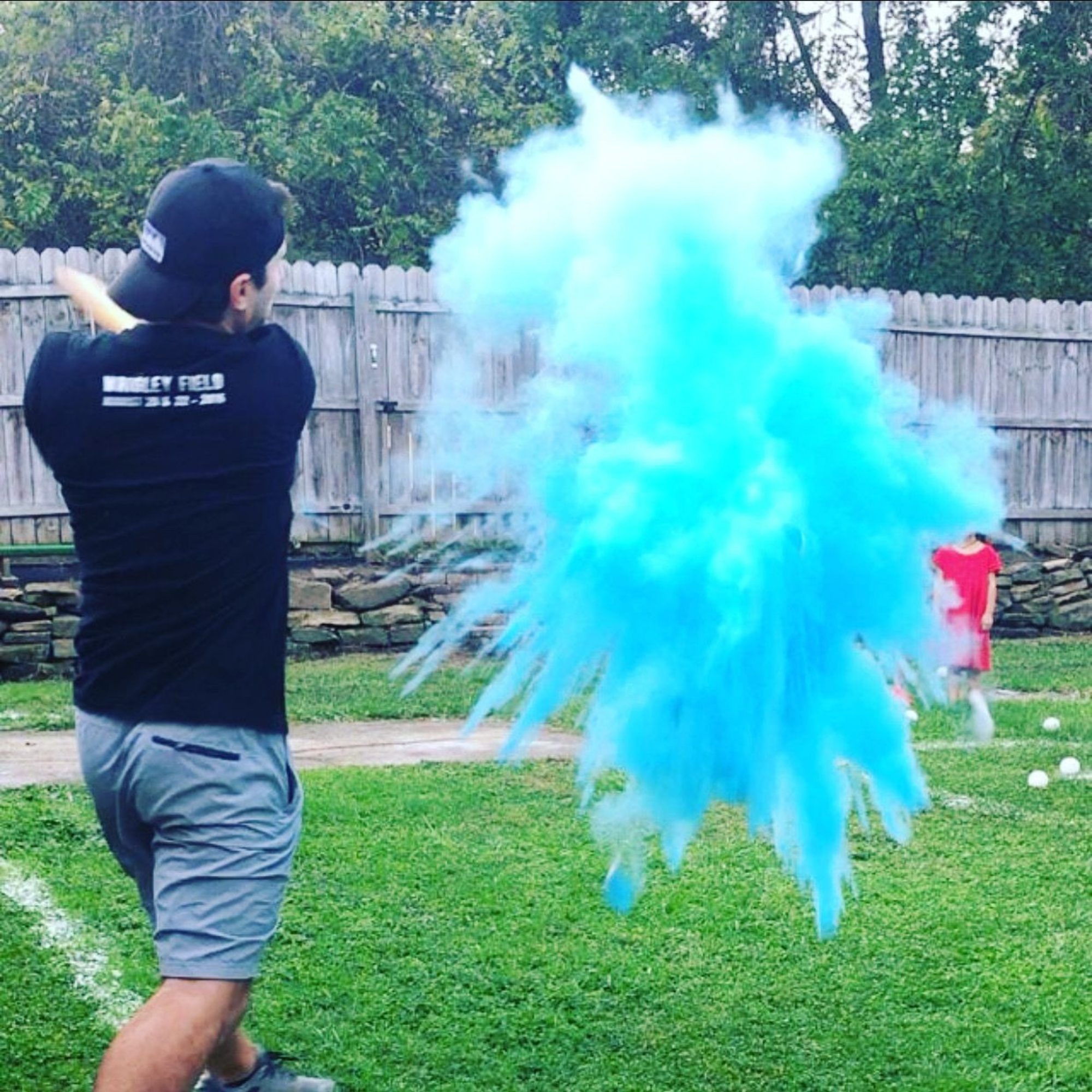 Blue Gender Reveal Cricket Ball Powder Explosion.